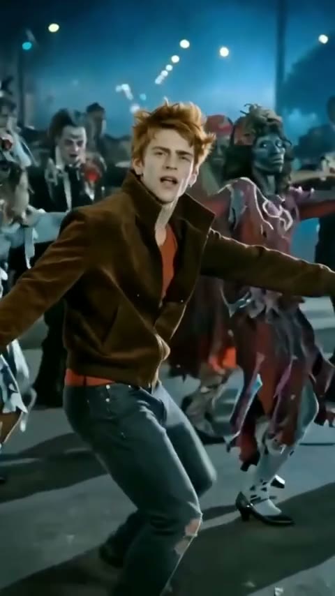 Sample 1: a young man in a brown jacket leads the zombie dance